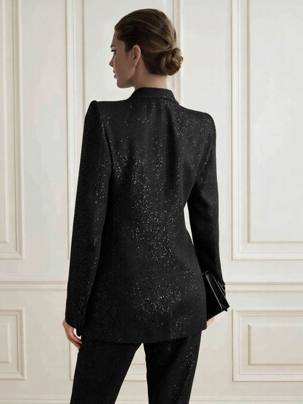 Black sequin blazer back view, structured shoulders and long sleeves