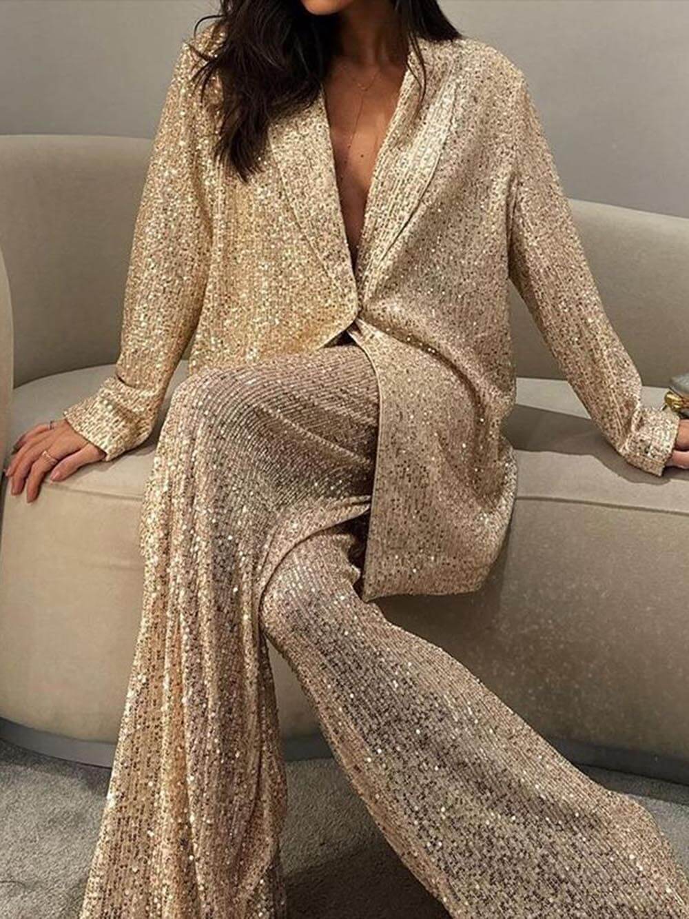 Gold sequin longline blazer with open V-neck and flowing relaxed drape