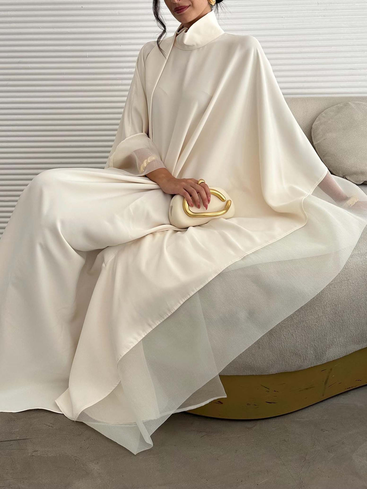 Cream satin high-neck kaftan maxi dress with batwing sleeves and flowing draped skirt