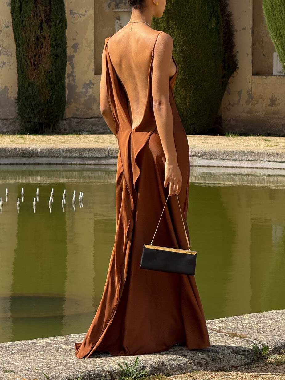 Tobacco satin slip maxi dress with open back, spaghetti straps, and high side slit.