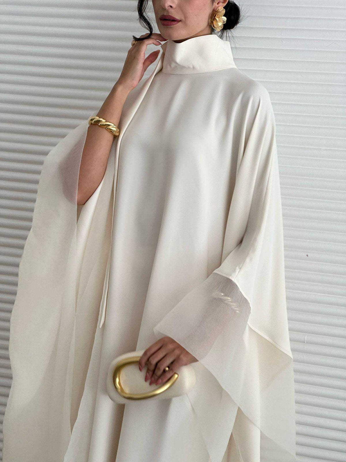Cream satin high-neck kaftan maxi dress with batwing sleeves and draped front panels