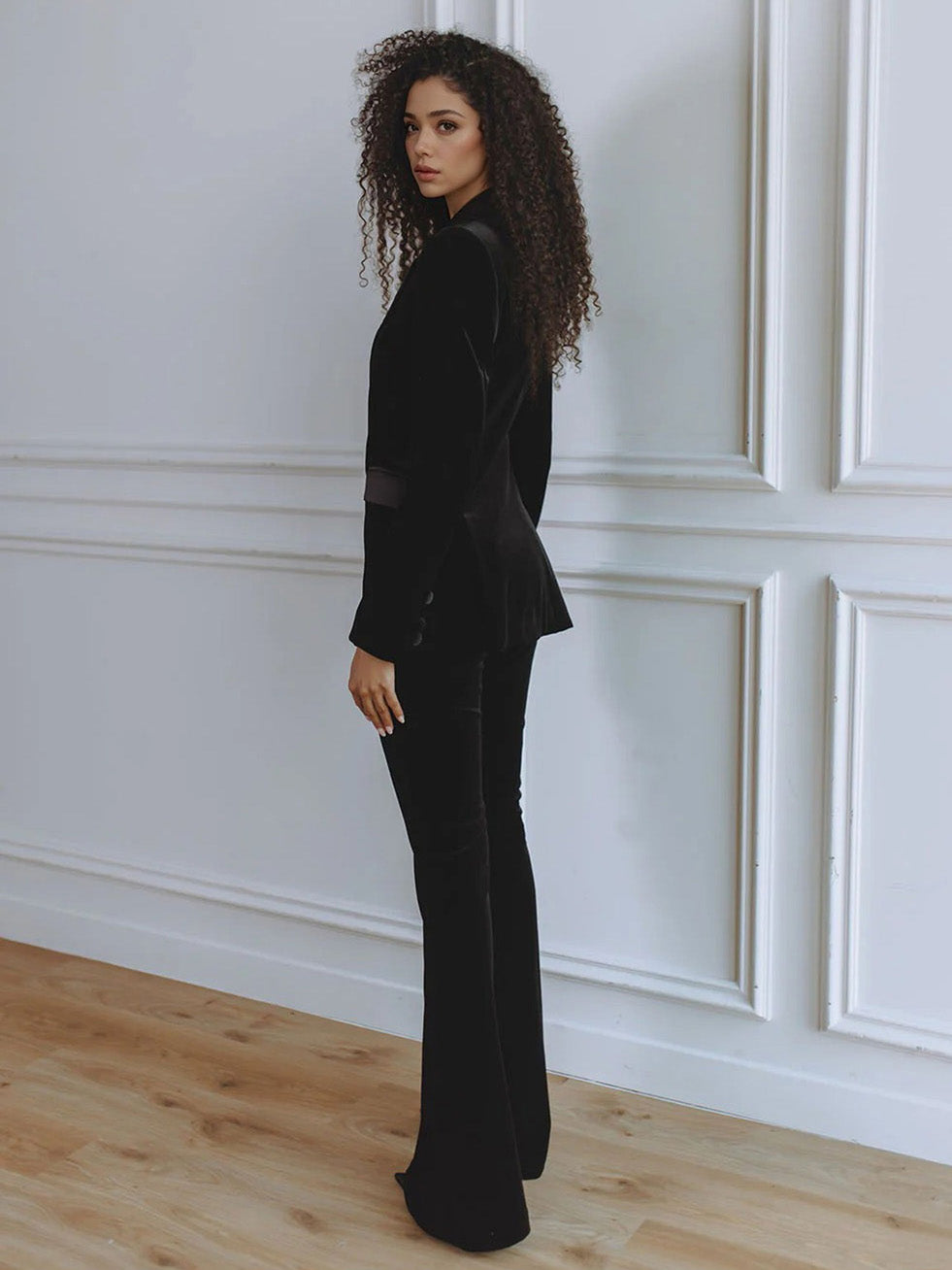Women's black velvet slim-fit blazer with satin lapel trim, single-button front