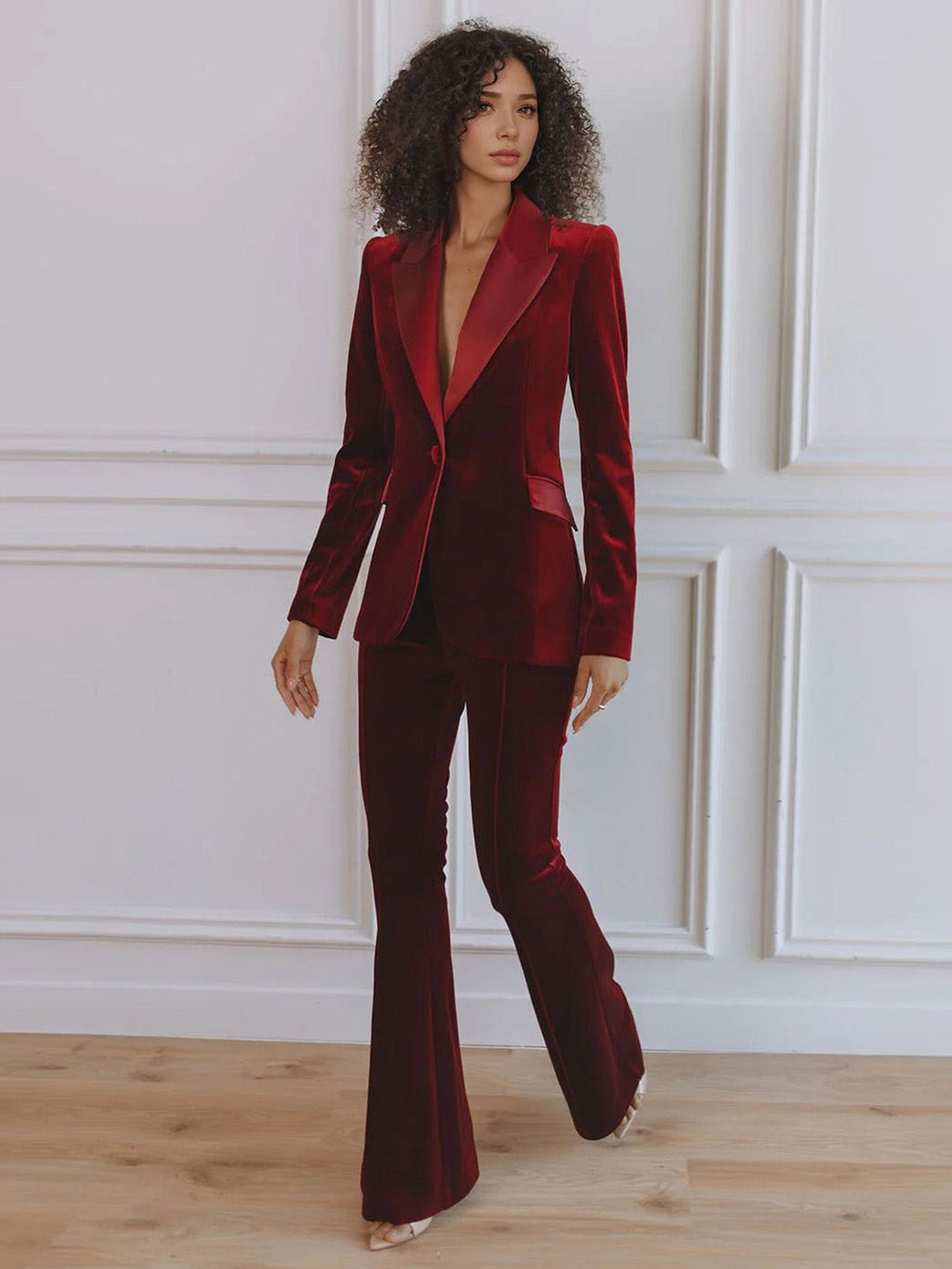 Women’s red velvet blazer with satin lapel trim, tailored fit and flared trouser legs