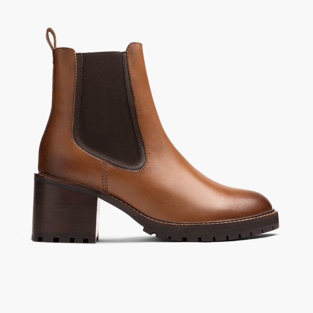 Brown chelsea boots with dark elastic side panels and chunky block heel