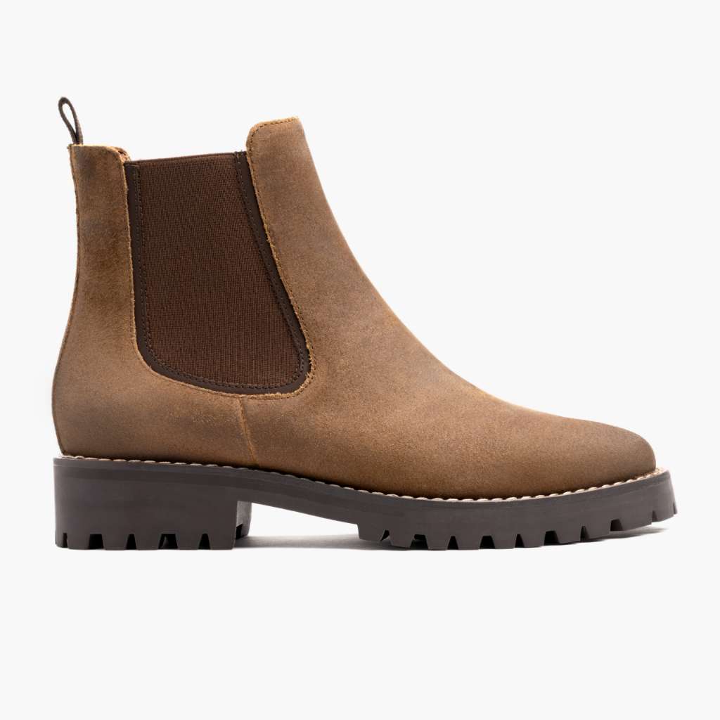Brown suede Chelsea boot with elastic side panel and dark lug rubber sole