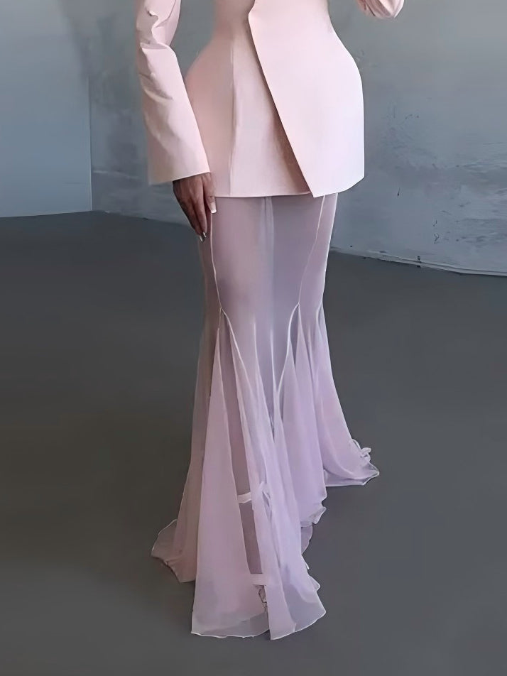 White sheer mesh flare-leg trousers with high waist and ruffled hem