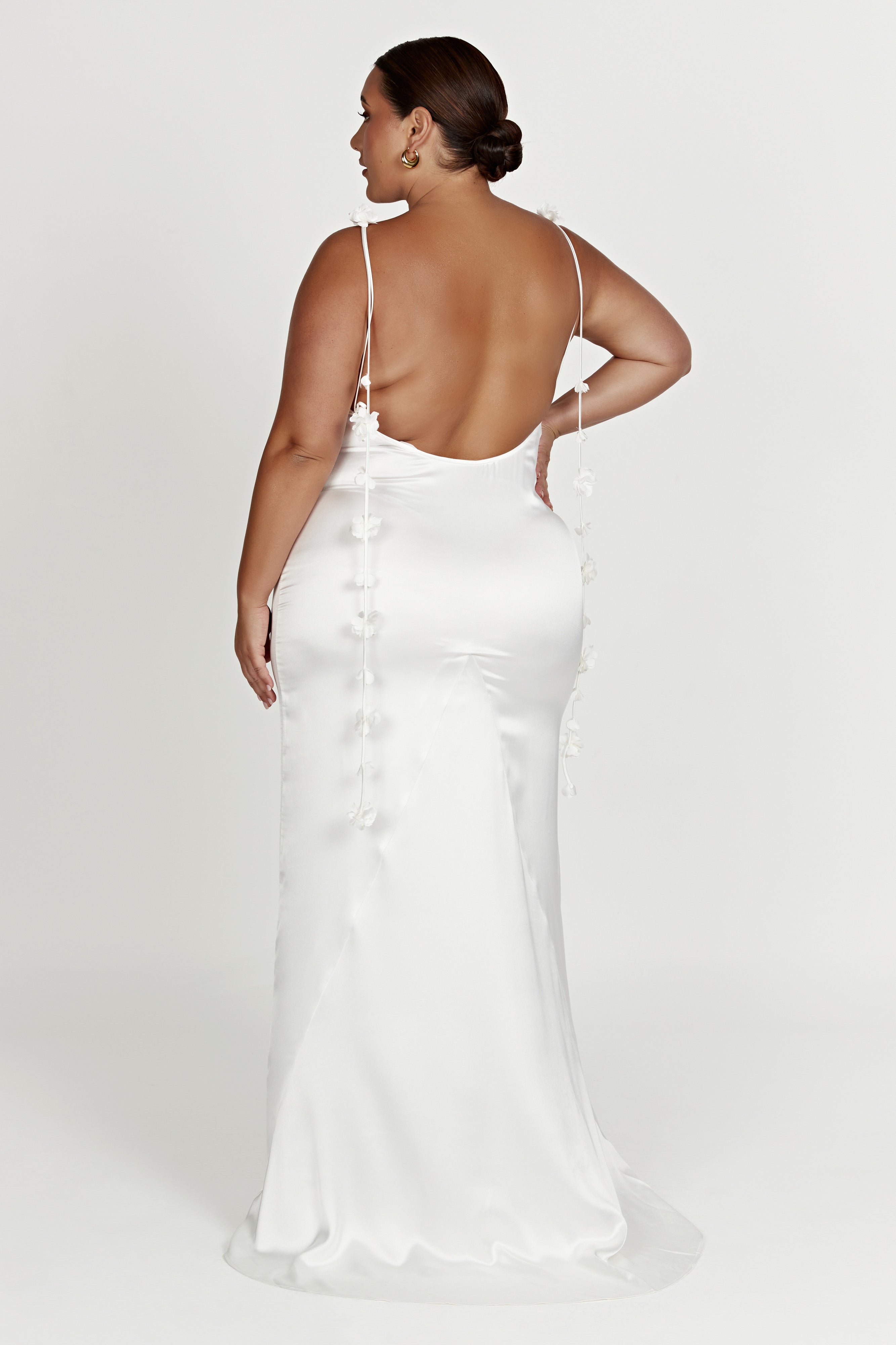 White satin slip maxi dress rear view with open back and floral strap details
