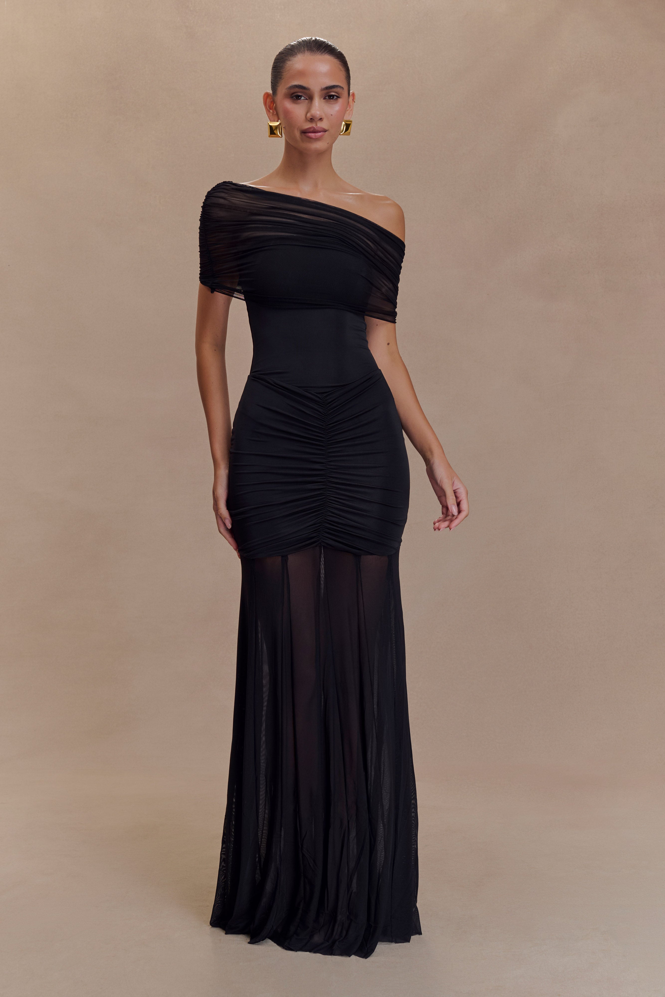 Black off-shoulder ruched bodycon maxi dress with ruched waist and sheer mesh skirt panel