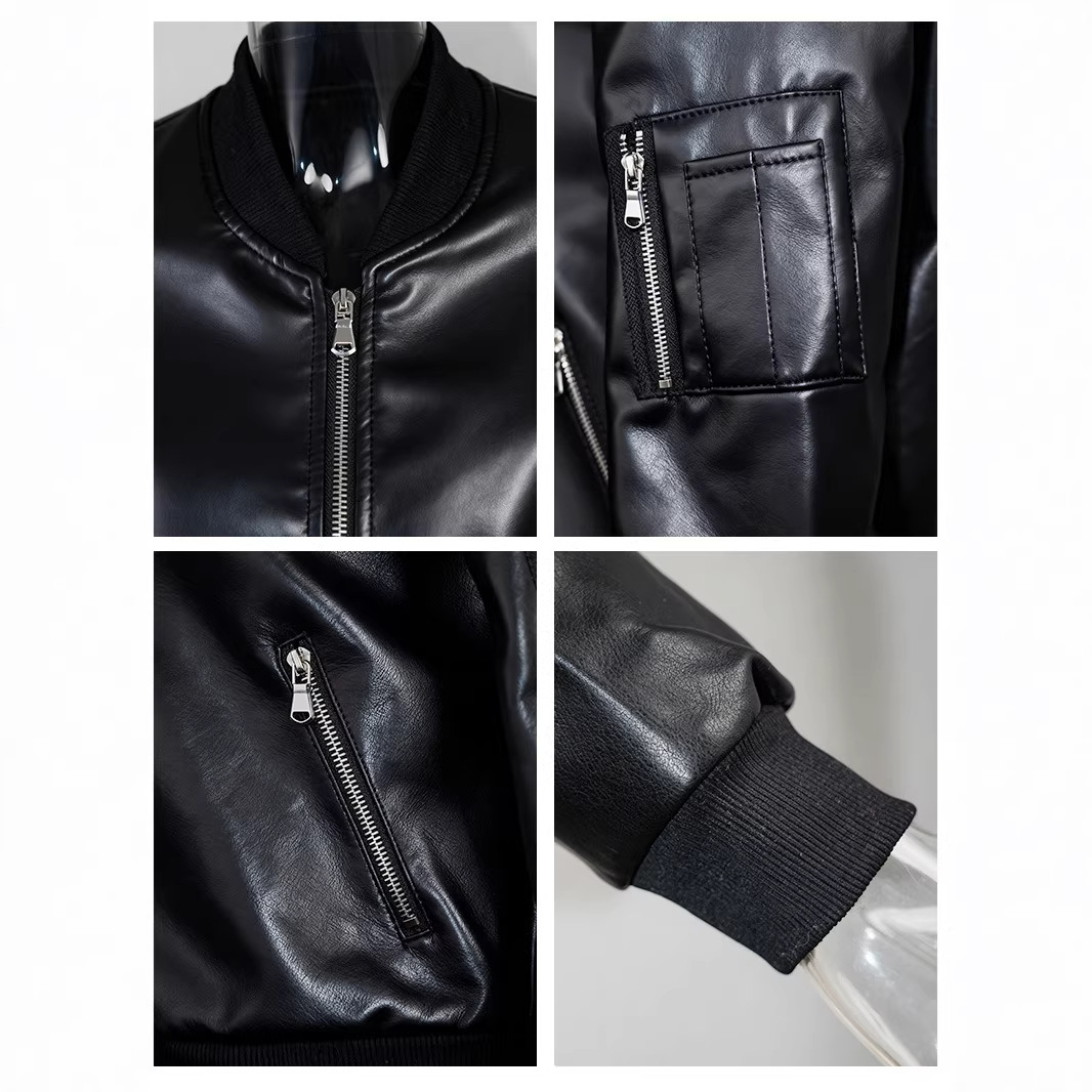 Black faux leather bomber jacket detail: zip front, zip pockets, ribbed collar and cuffs