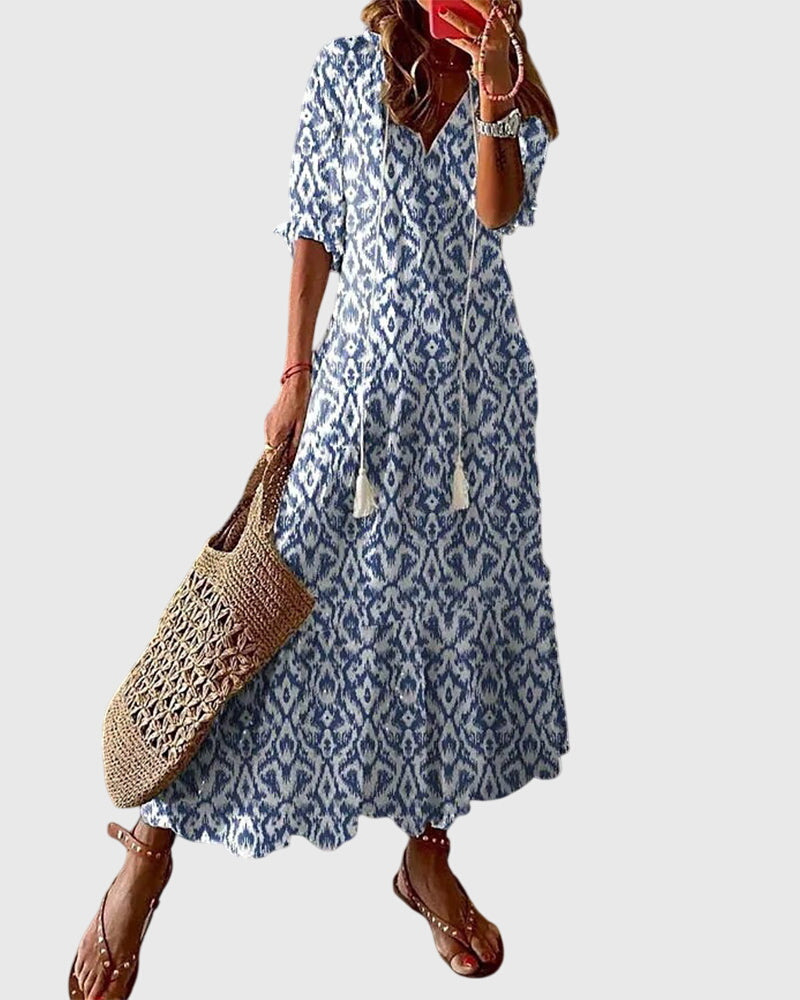 Blue boho summer dress with short sleeves and diamond print, tiered hem