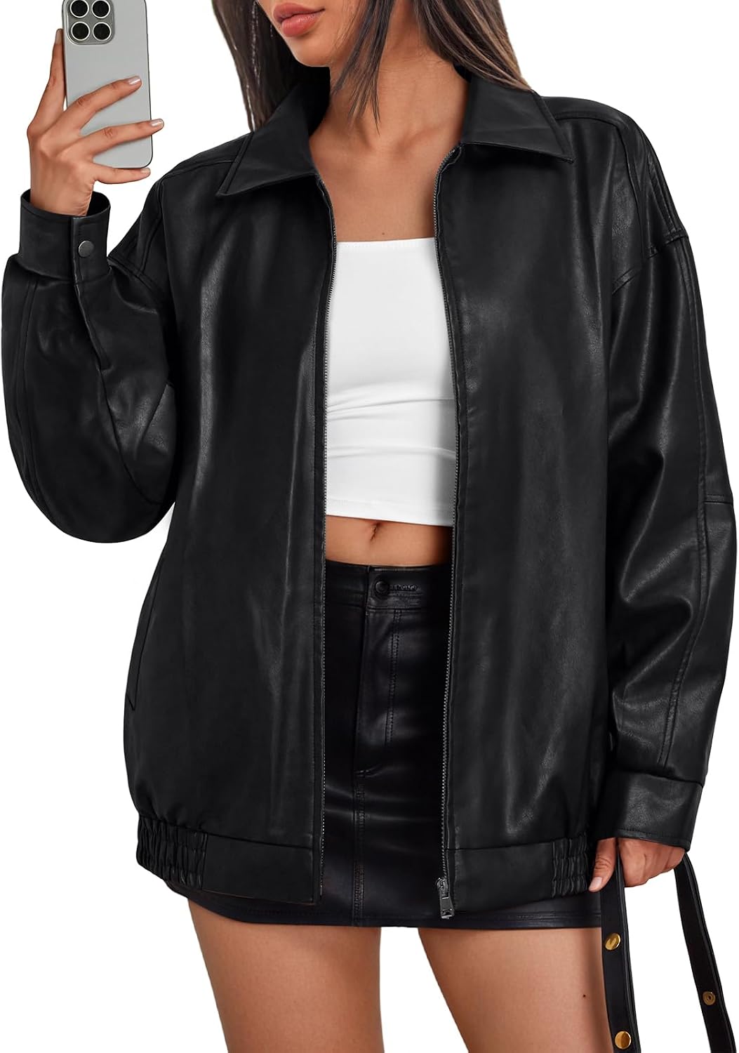 Black oversized leather bomber jacket with a zip front, wide collar, and elastic hem