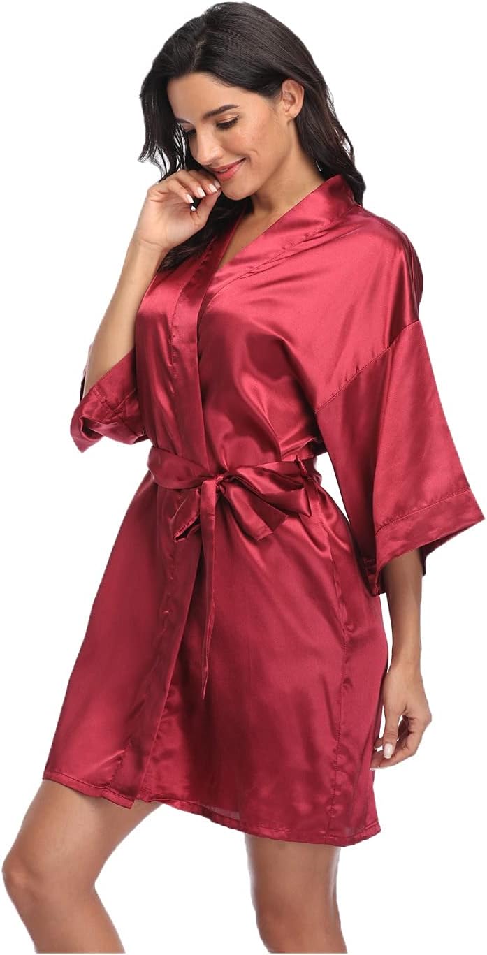 Deep red satin robe with a tie belt and wide sleeves
