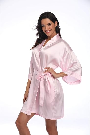Women's pale pink satin robe with a tie belt and wide sleeves