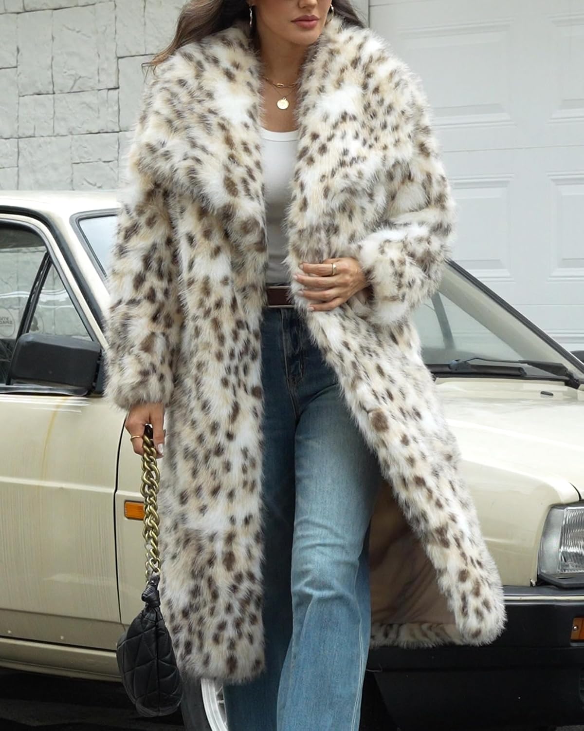 Long cream faux fur coat with brown and black animal spots, wide collar and open front