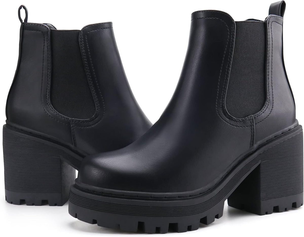 Pair of black Chelsea ankle boots with elastic side panels and chunky lug soles