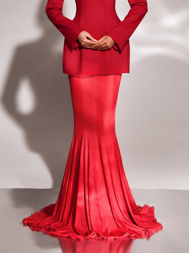 Red sheer mesh flare-leg trousers with high waist and ruffled hem