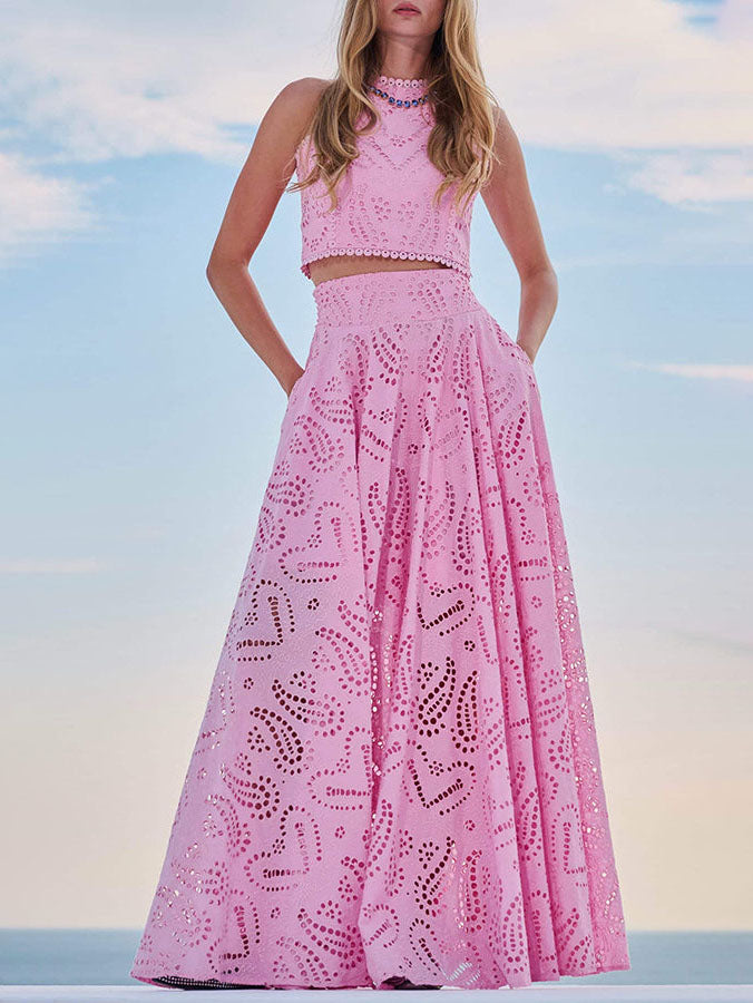 Pink eyelet lace high-waist maxi skirt, full A-line flare with repeating cutout pattern