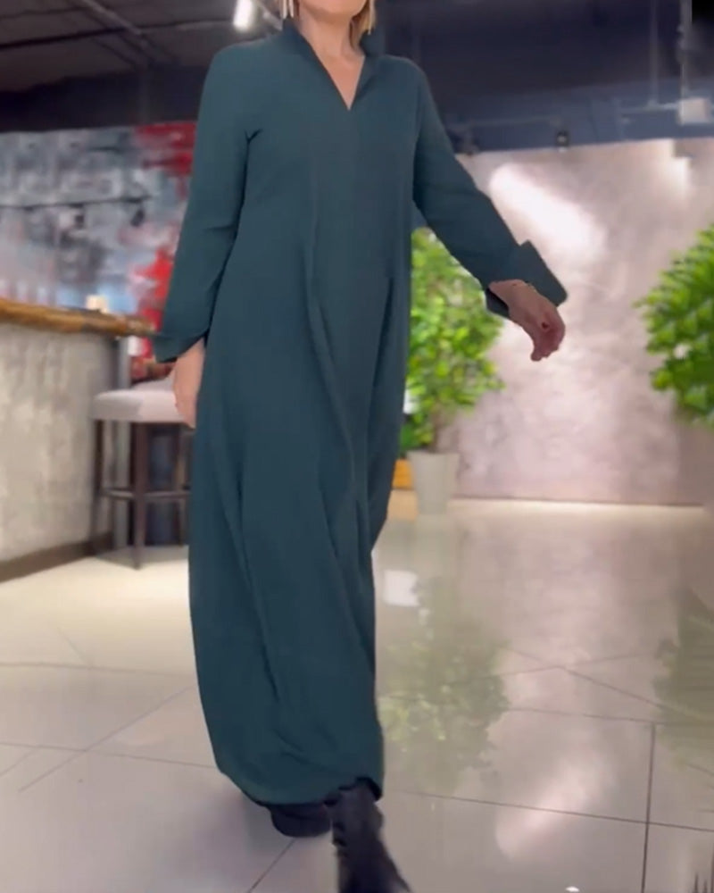 Teal long-sleeve maxi dress with stand collar, loose fit, side pockets