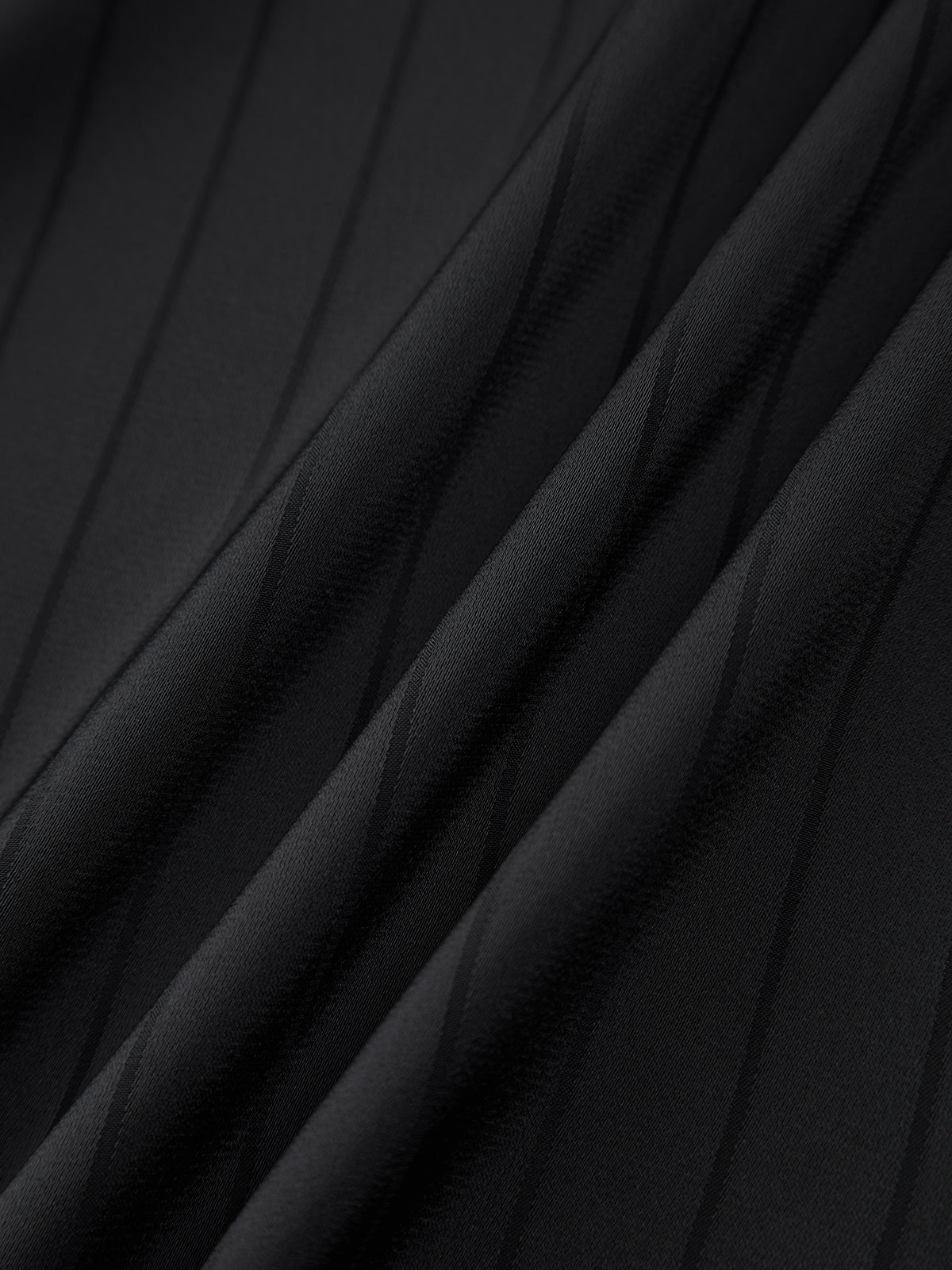 Black satin fabric swatch with subtle tonal vertical stripes