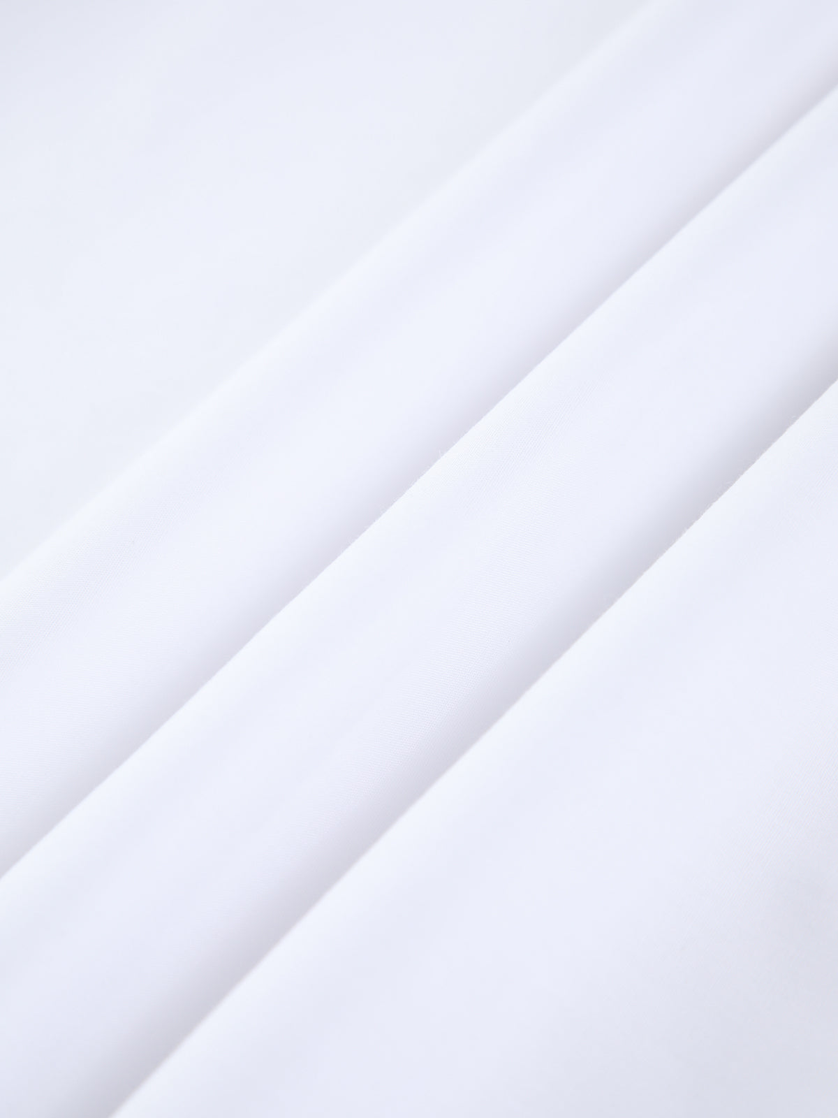 White viscose fabric close-up with smooth drape and lightweight weave