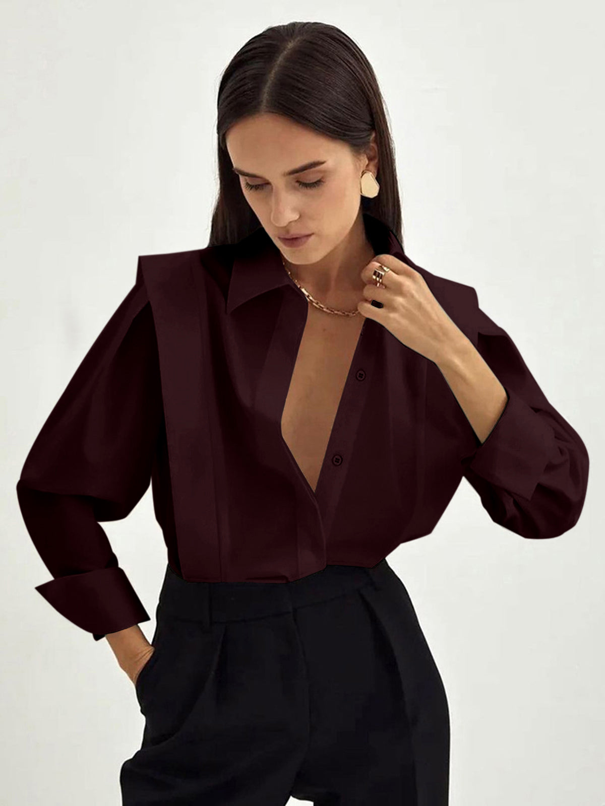 Burgundy cotton oversized button-down blouse with structured power shoulders and pointed collar