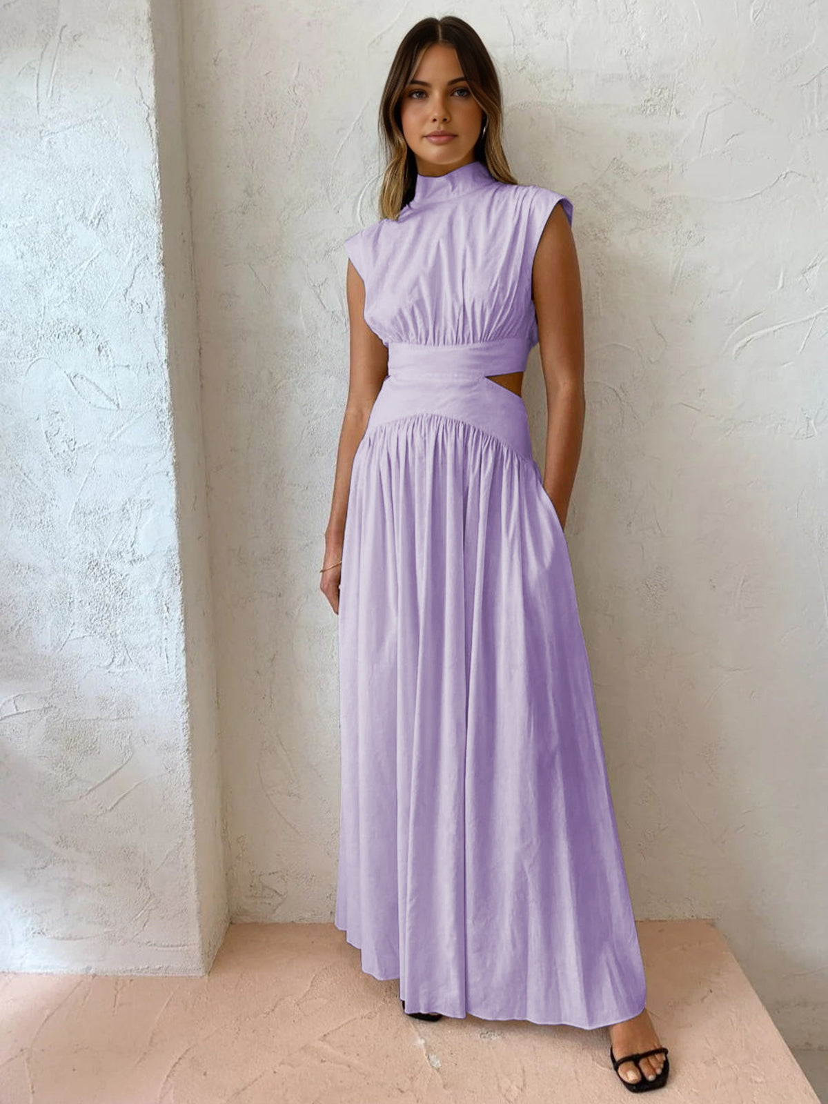 Lavender sleeveless mock-neck maxi dress with ruched bodice and gathered full skirt