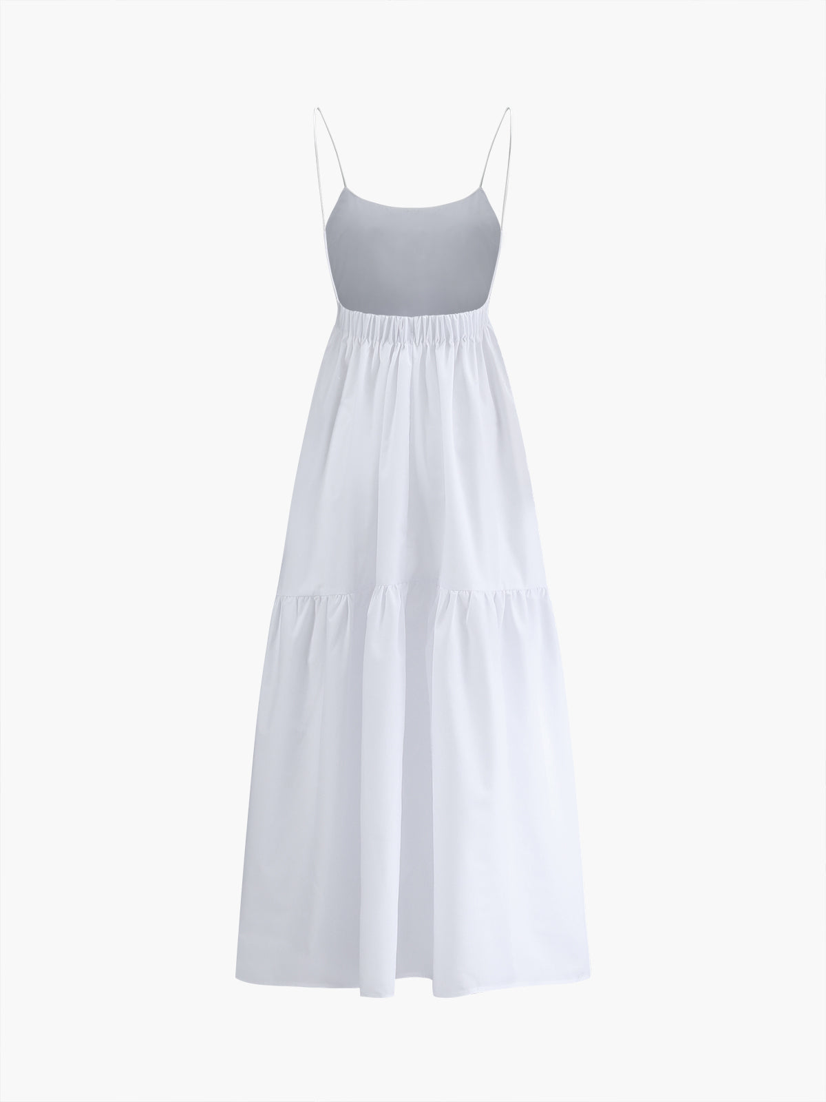 White solid backless long dress with spaghetti straps and tiered skirt