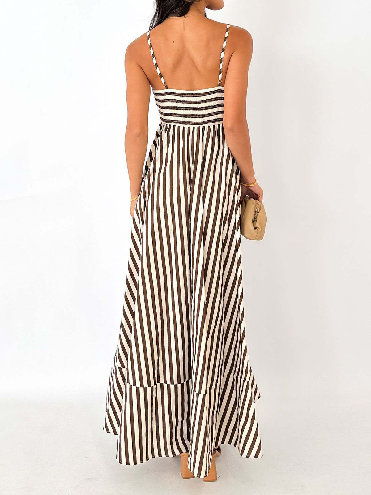 Backless striped pleated cami long dress with spaghetti straps and tiered skirt hem