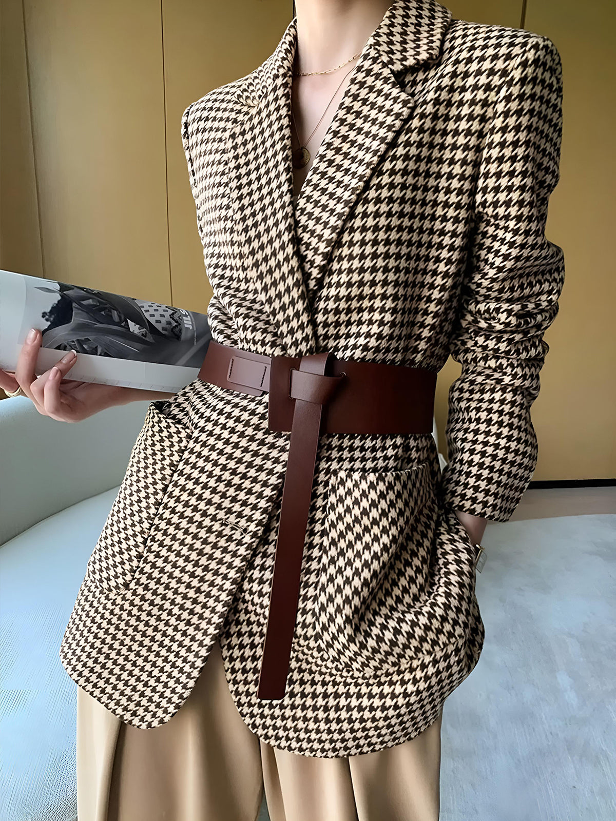 Women's houndstooth blazer with notch lapel and wide brown belt, long sleeves
