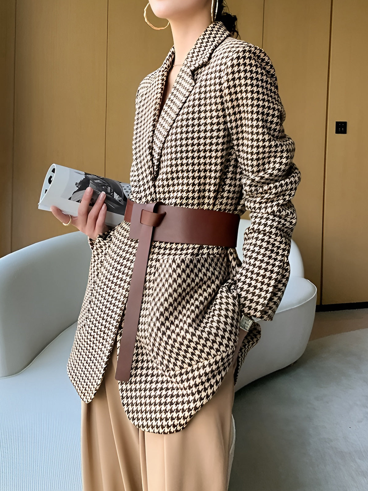 Women's oversized houndstooth blazer with notch lapel and brown tie belt, side view
