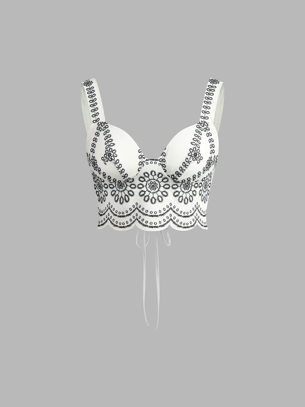 Black-and-white embroidered linen bustier crop top with scalloped floral edge