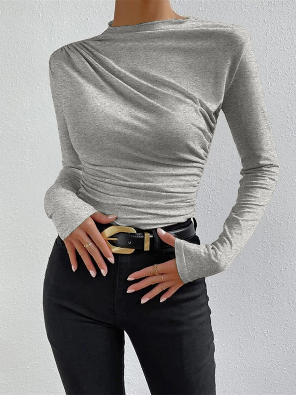 Light grey long-sleeve top with draped asymmetric neckline and ruched side seams