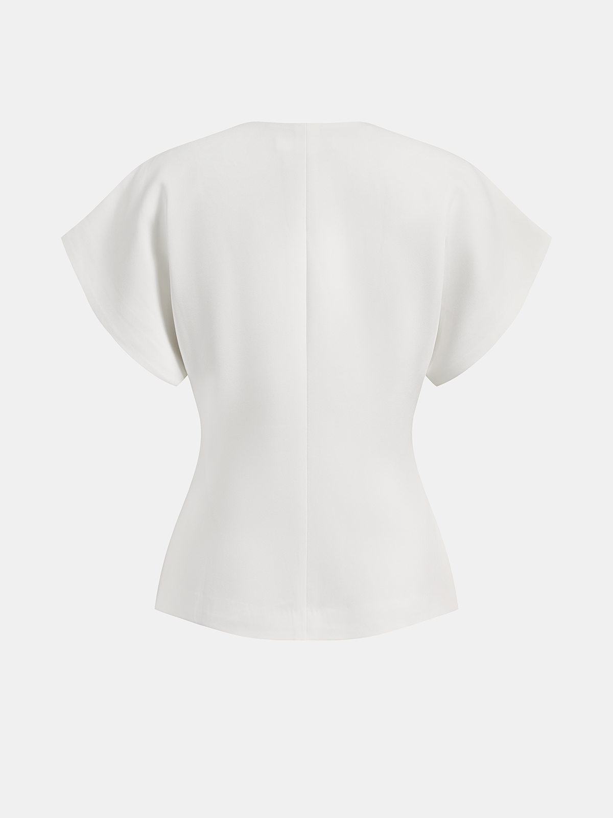 White crepe blouse back view with short sleeves and fitted peplum silhouette