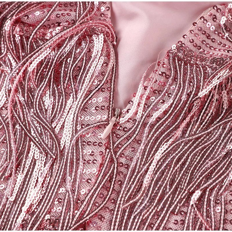 Pink sequin crystal fringe V-neck mini dress, close-up of beadwork