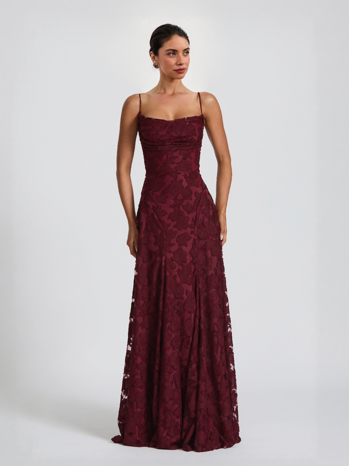 Burgundy spaghetti-strap floral maxi dress with fitted bodice and flared skirt