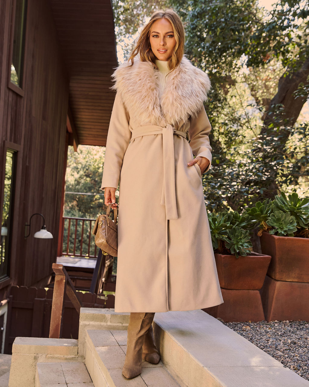 Beige faux fur collar long coat with belt, front button closure and pockets