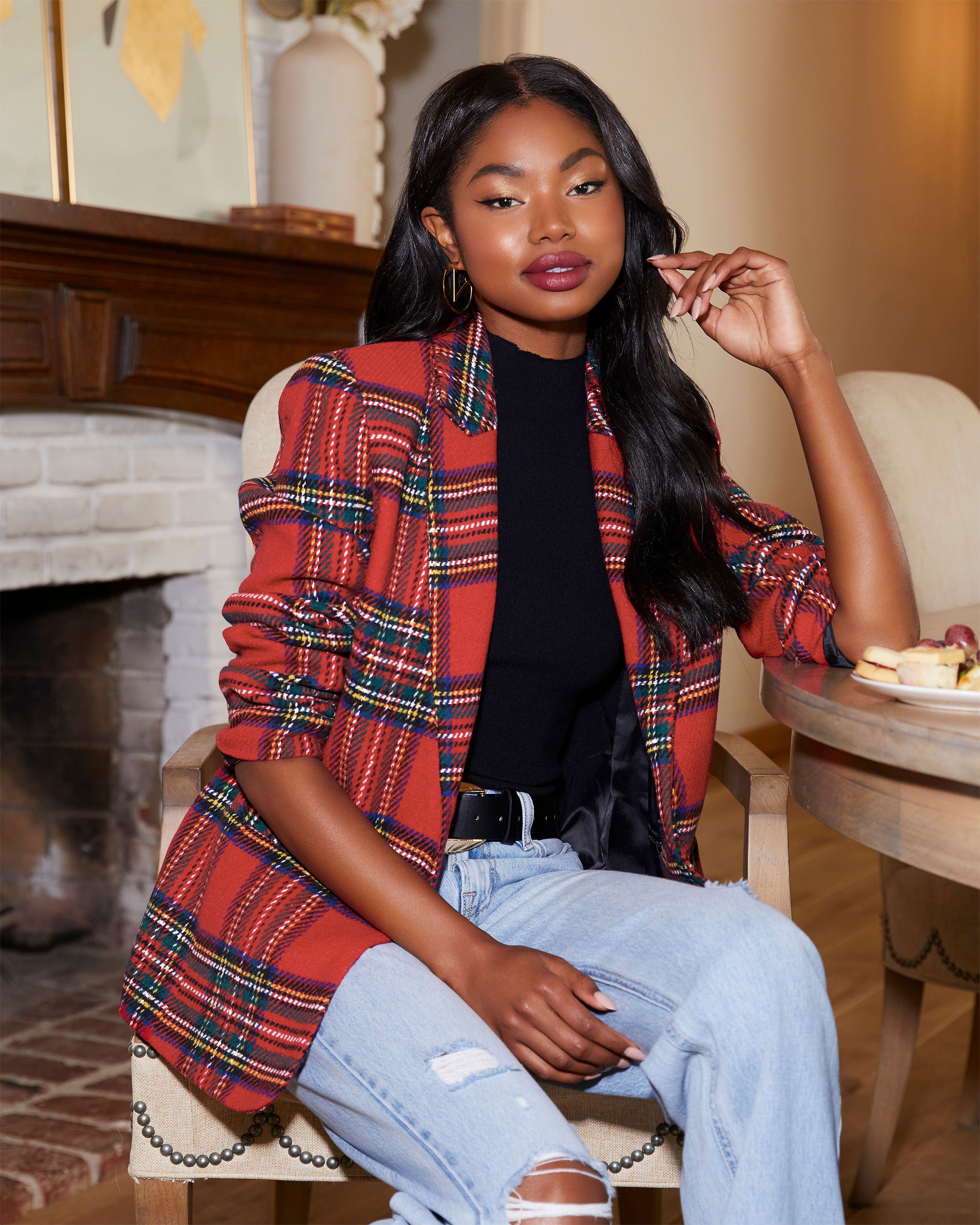 Red, green, and black plaid blazer with lapels and patch pockets; bracelet detail