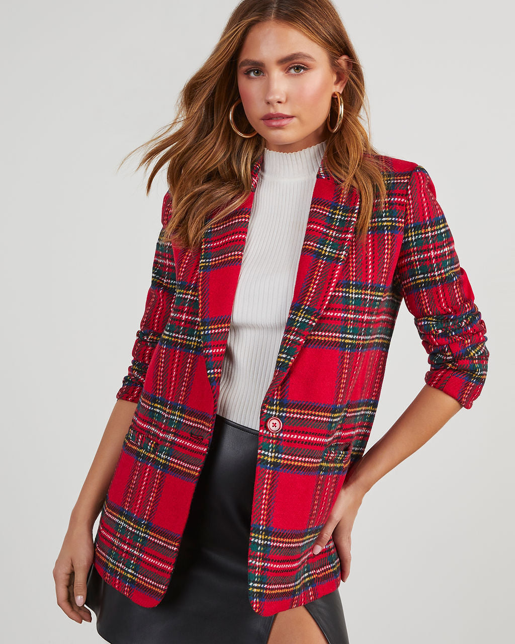 Red and green plaid blazer with lapels, button-front, and patch pockets