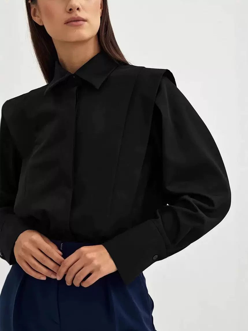 Black cotton oversized button-down blouse with structured power shoulders