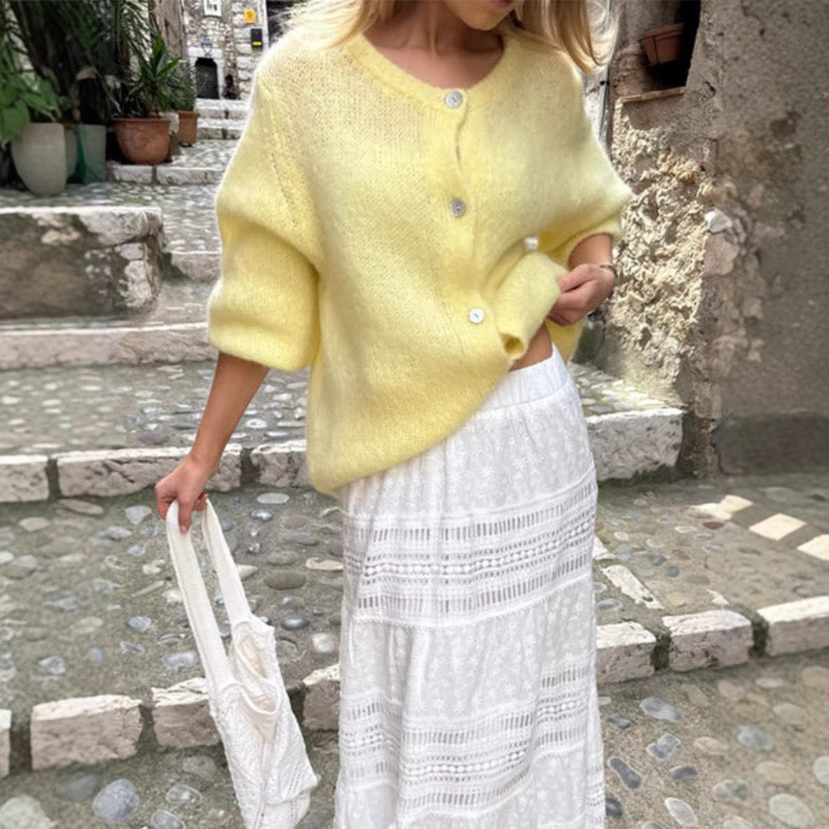 Yellow cropped button-front cardigan sweater with round neckline and short sleeves