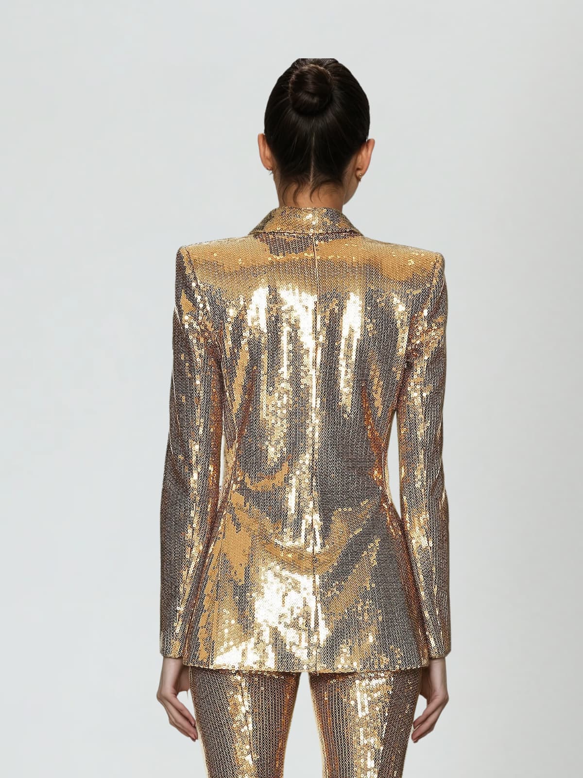 Gold sequin blazer and flare trousers suit, back view with long sleeves