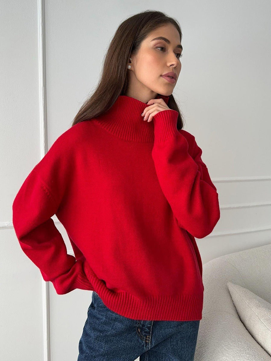 Loose turtleneck knit sweater in red, ribbed turtleneck, relaxed fit.