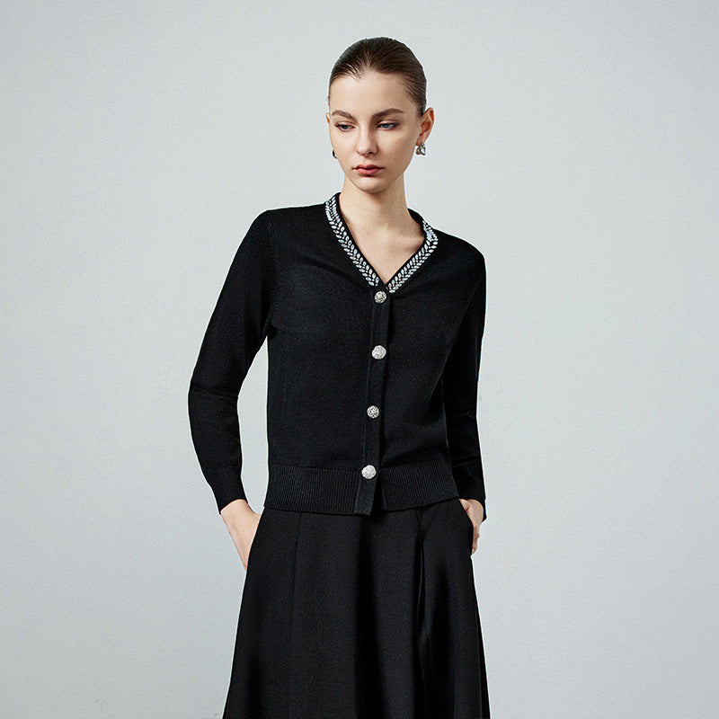Black wool knit V-neck cardigan with beaded trim, button front, long sleeves