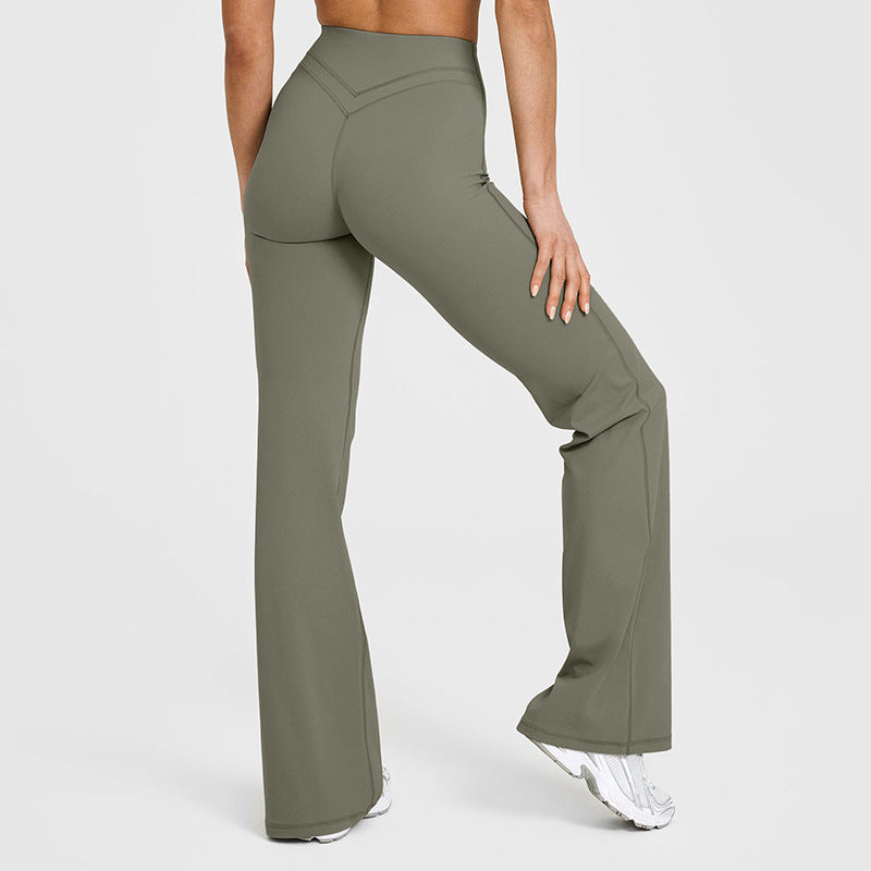 Women’s flared yoga pants in olive green with high-rise waistband and wide-leg flare