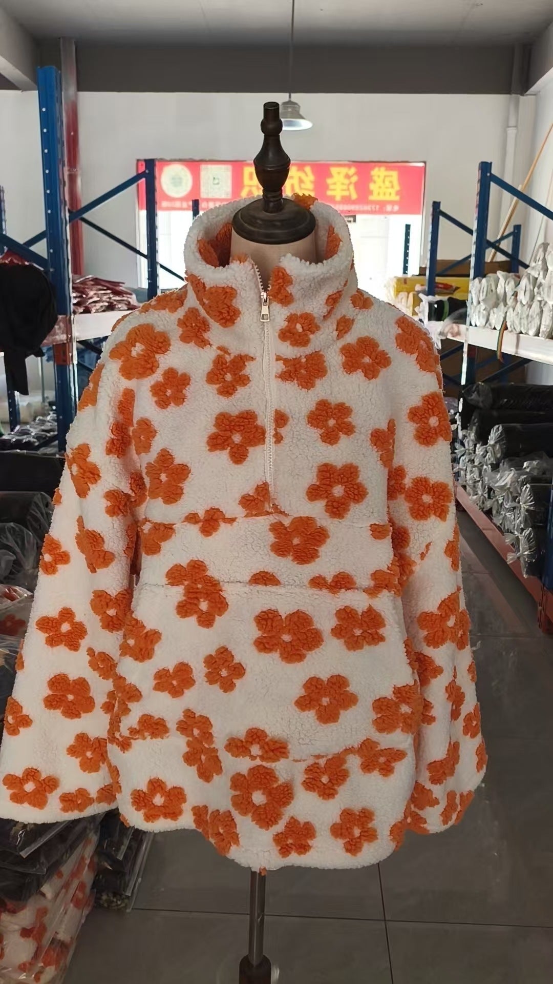 Orange-and-cream floral fleece full-zip hoodie sweatshirt with front pockets and hood