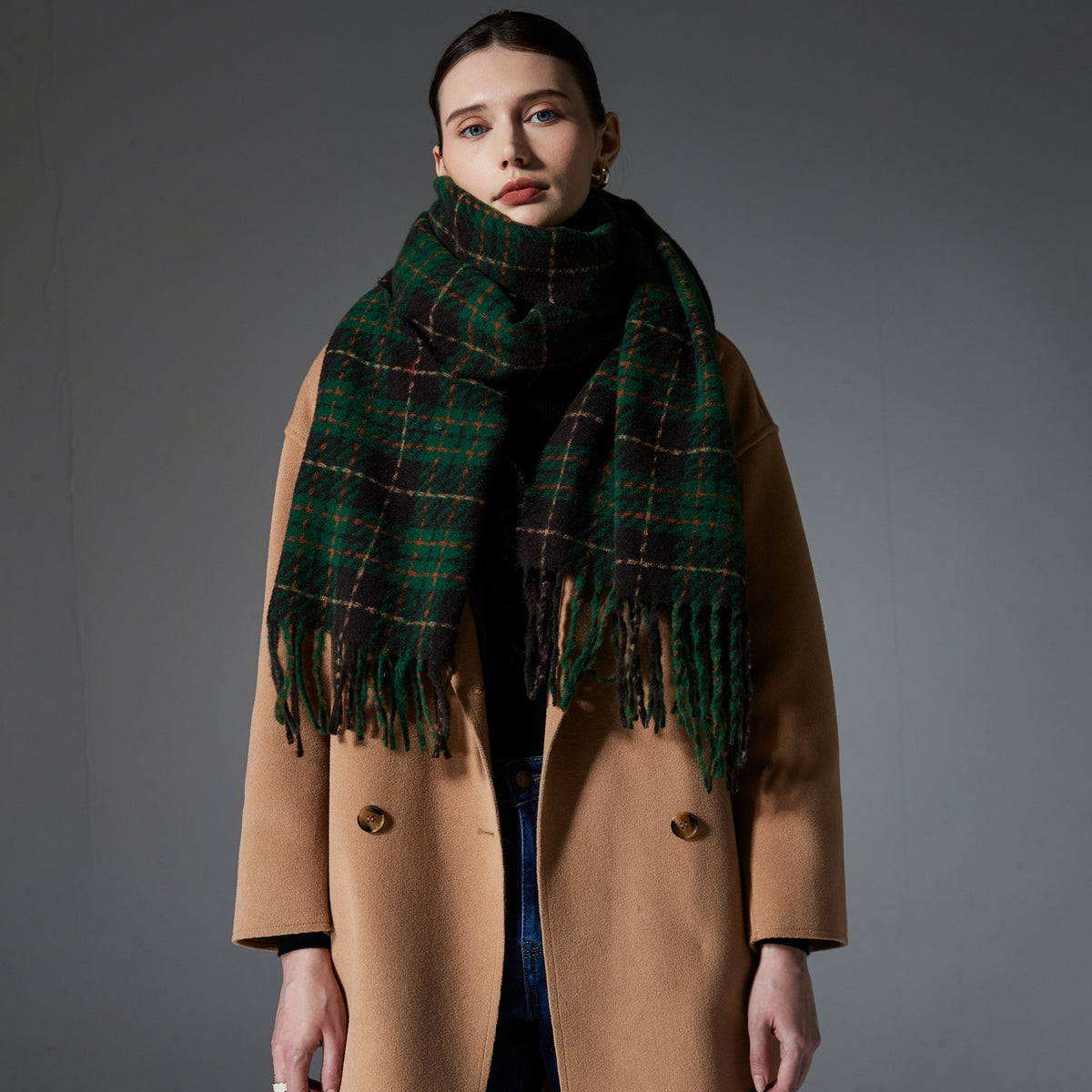 Green plaid scarf with dark fringe ends