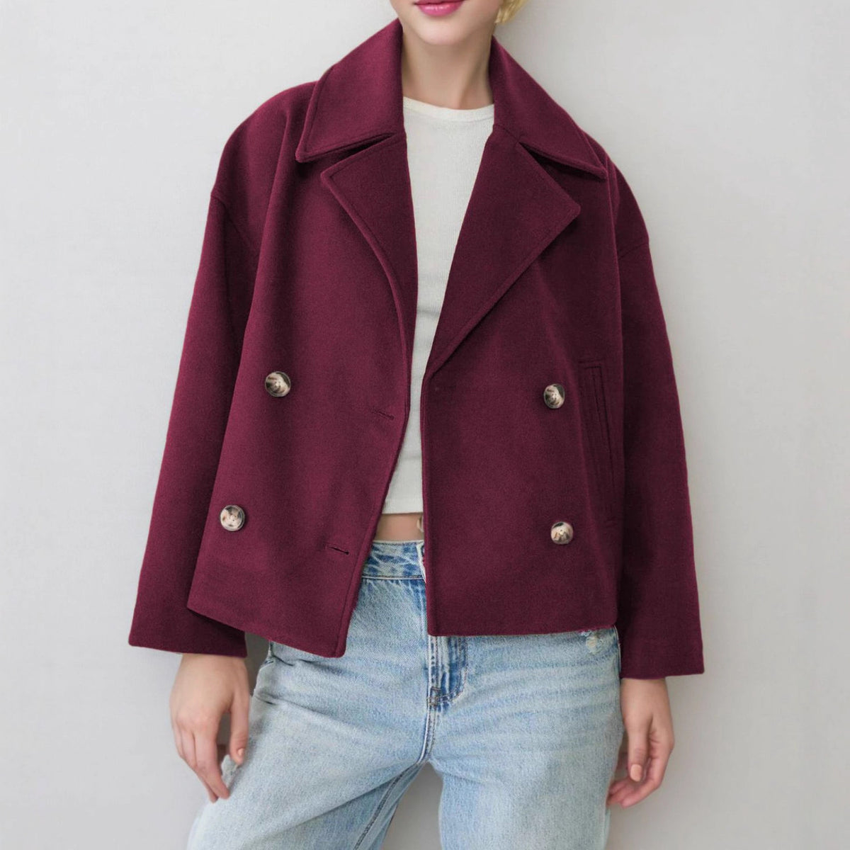 Burgundy double-breasted short wool jacket with notched lapels and silver buttons