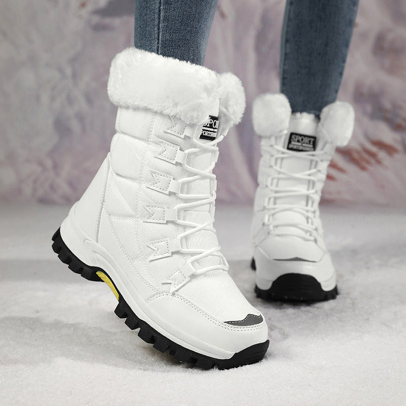 Women’s mid-calf snow boots with white fleece lining and lace-up styling, rugged tread