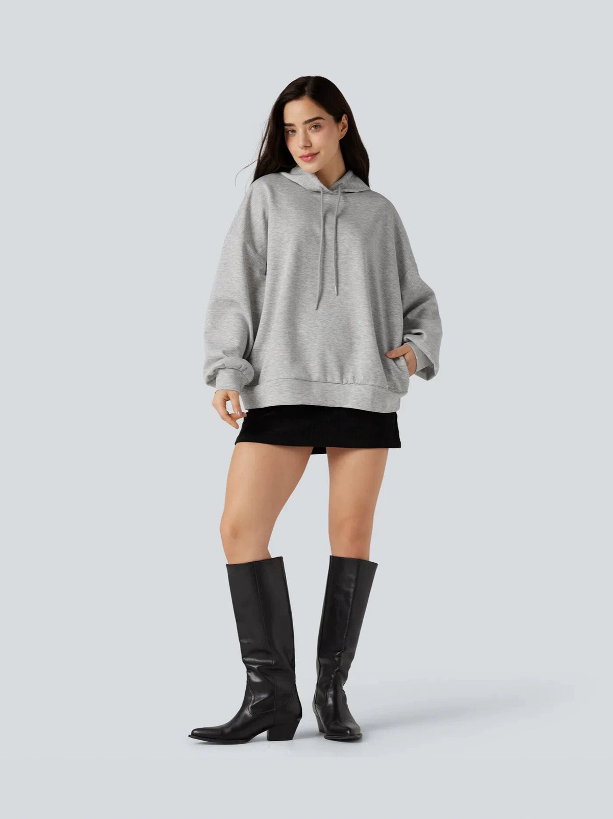 Light gray hooded sweatshirt pullover with kangaroo pocket, loose drop-shoulder fit