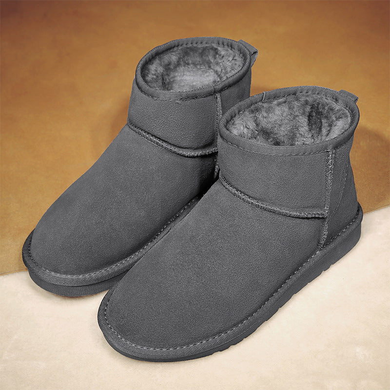Gray winter ankle boots with plush fur lining and cushioned low sole